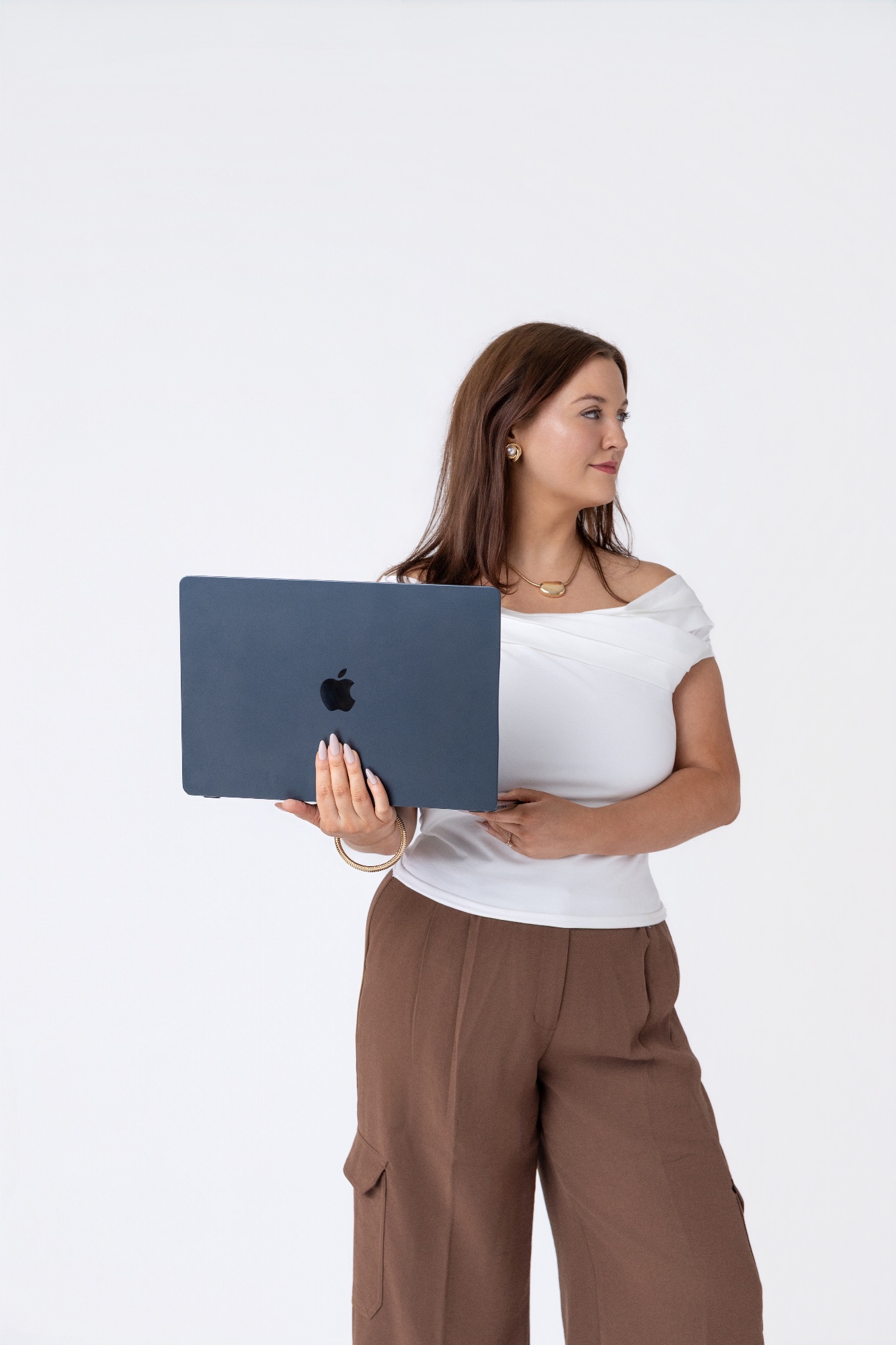 Brittani holding a laptop